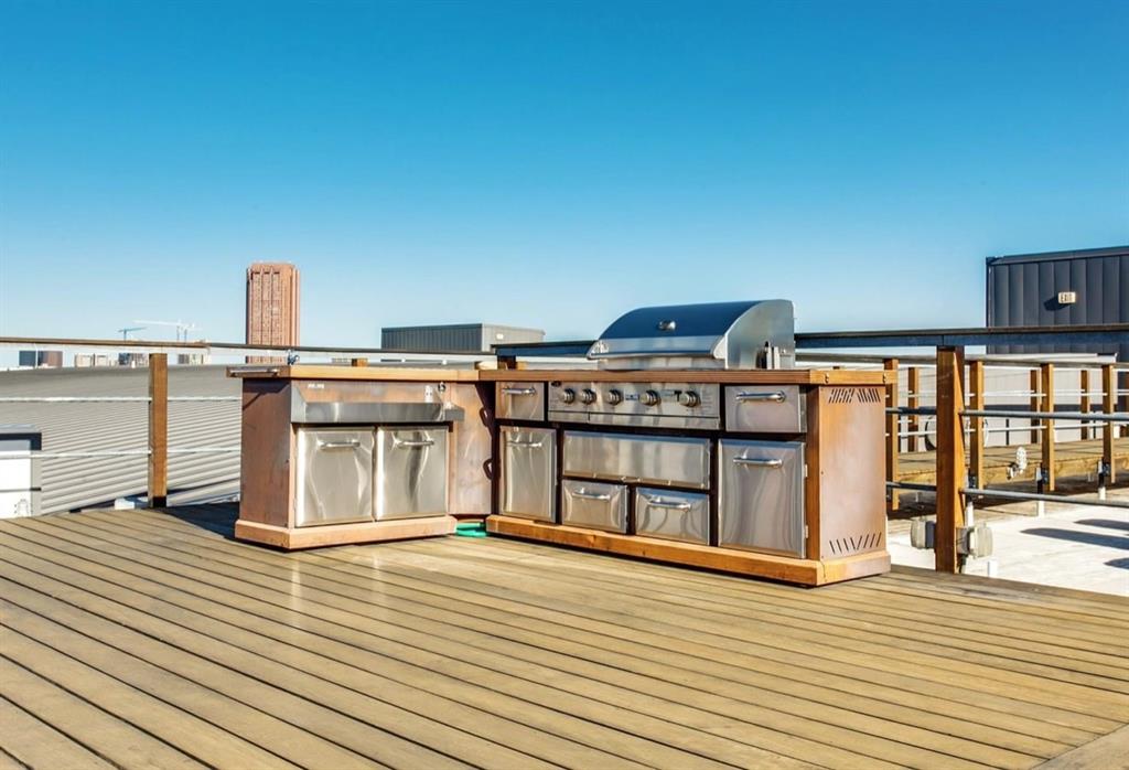 3030 Bryan Street, Unit 409 Dallas, TX 75204 - Photo 27 of 30 a view of a terrace with seating space