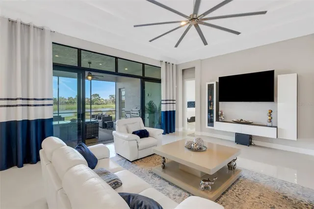 a spacious bedroom with a large bed and a flat screen tv