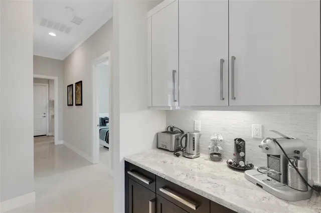 a bathroom with a tub a sink and a shower