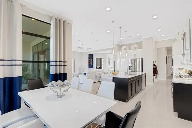 a bathroom with a granite countertop sink toilet a mirror and shower