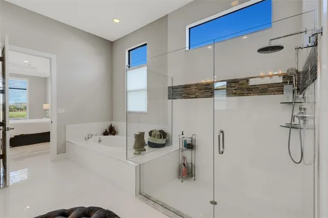 a living room with furniture and windows