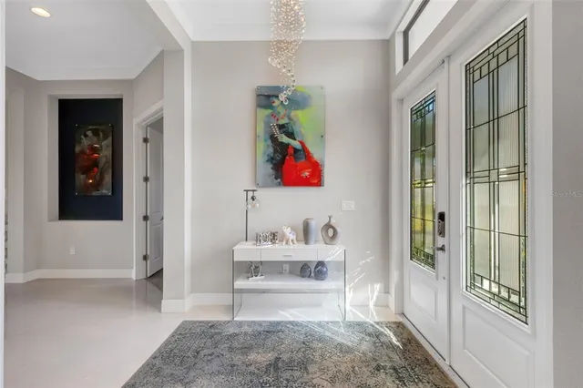 a kitchen with a sink cabinets and utility
