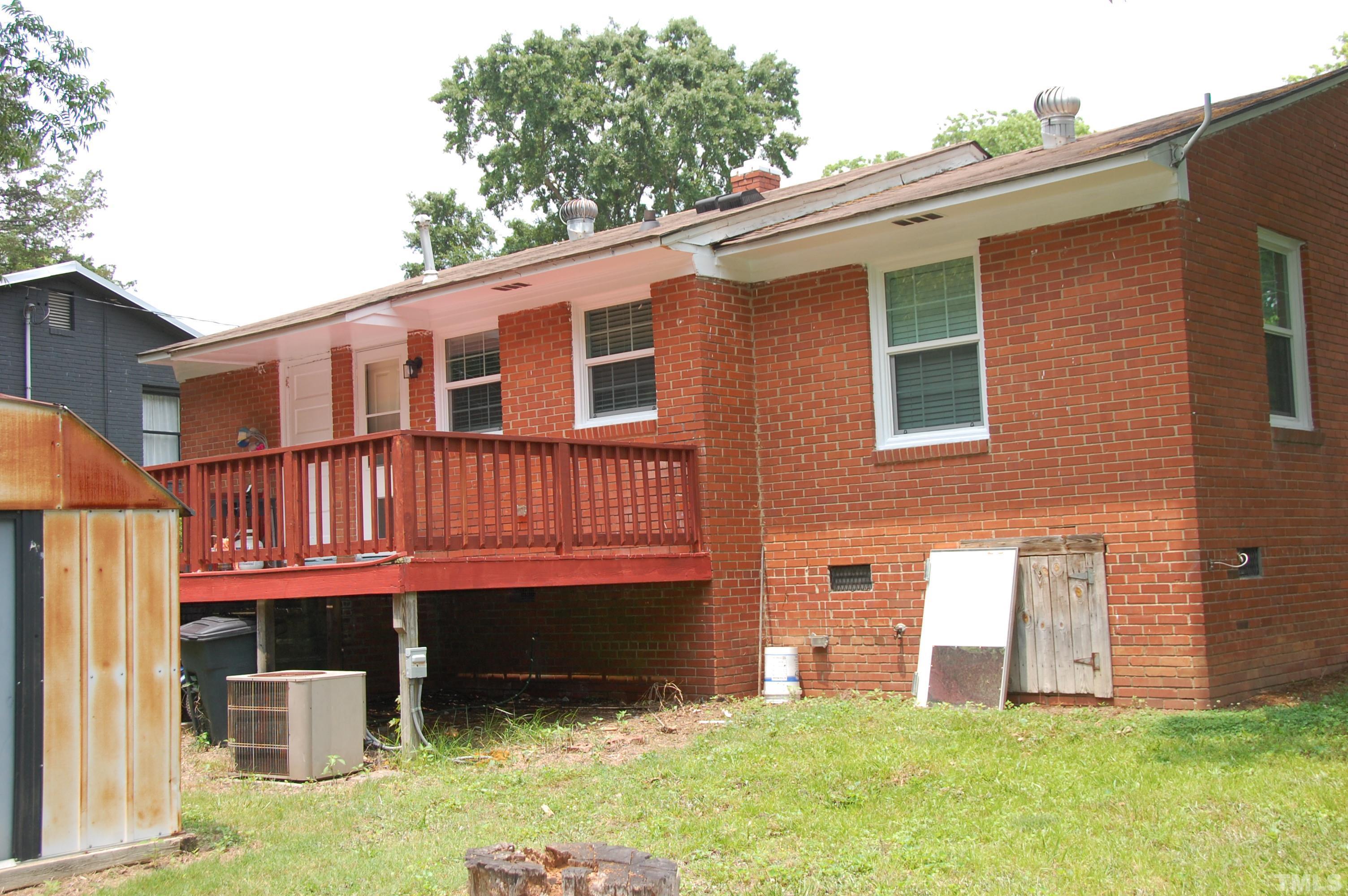 2406 Boswell Road Raleigh, NC 27610 - Photo 17 of 21 a view of front of a house with a yard