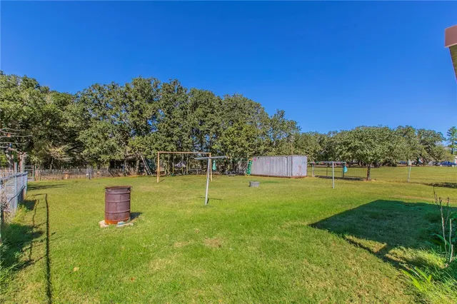 a view of a golf course with a lake