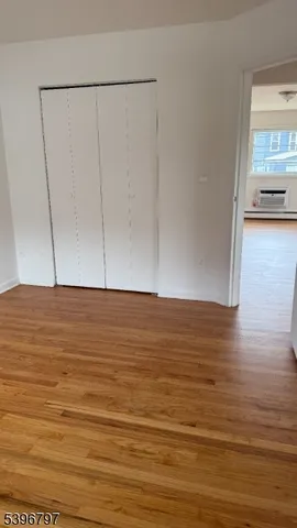 a view of room and wooden floor