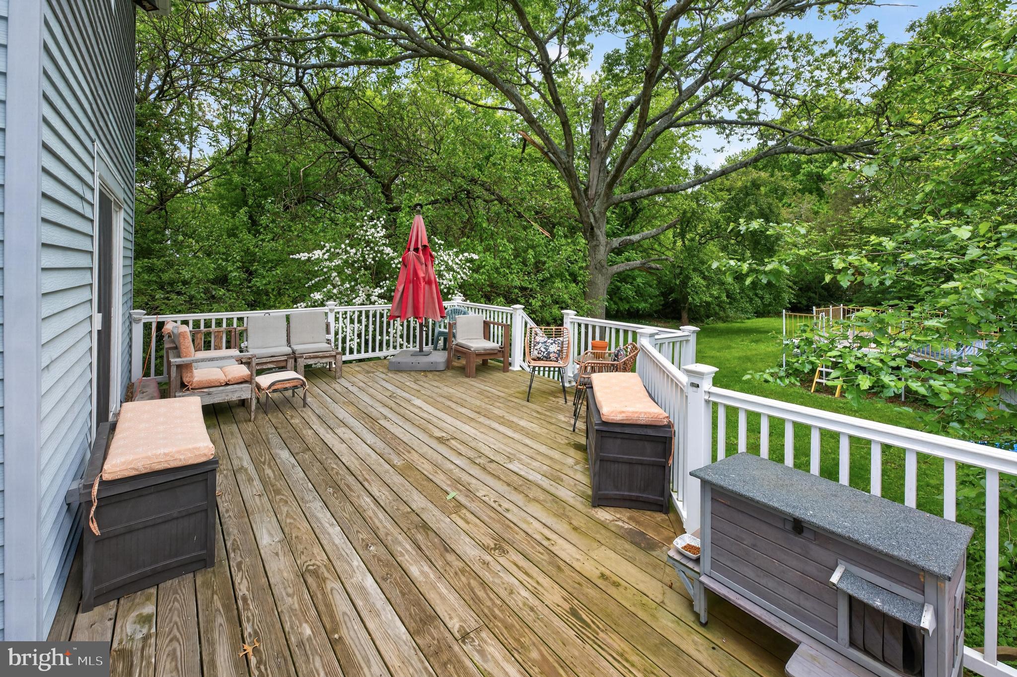 306 Anna Avenue Maple Shade, NJ 08052 - Photo 18 of 31 Oversized deck nestled in lush greenery