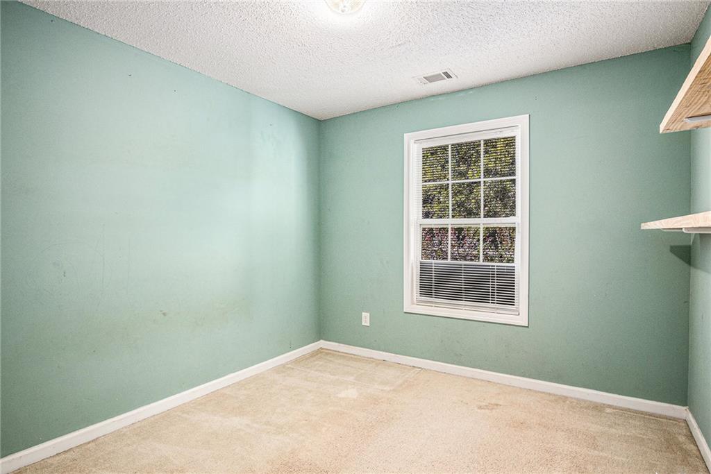 1224 Dylan Way Bethlehem, GA 30620 - Photo 18 of 33 an empty room with a window