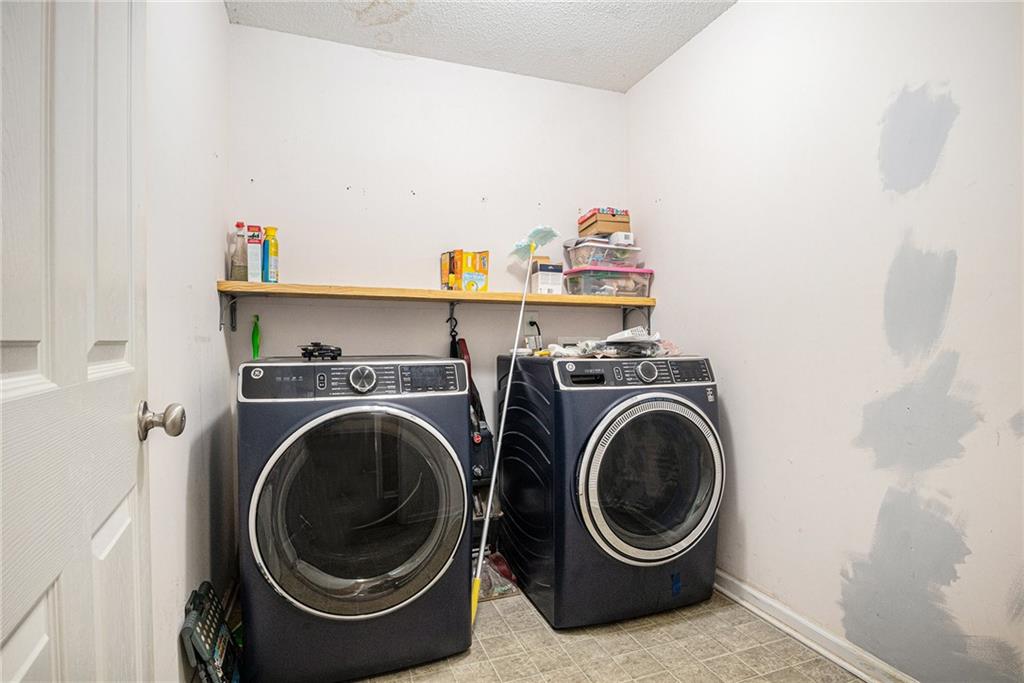 1224 Dylan Way Bethlehem, GA 30620 - Photo 21 of 33 a utility room with dryer and washer