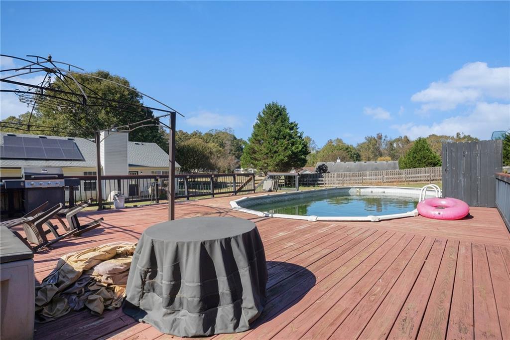 1224 Dylan Way Bethlehem, GA 30620 - Photo 30 of 33 a view of swimming pool with lounge chair