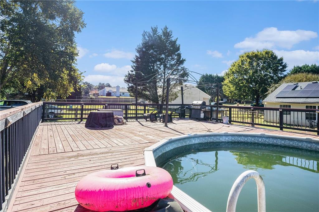 1224 Dylan Way Bethlehem, GA 30620 - Photo 31 of 33 a view of house with swimming pool yard and outdoor seating