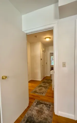a kitchen with a table and chairs in it