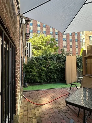 a view of a house with a back yard