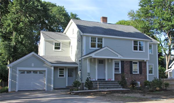 298 Brookline Street Needham, MA 02492 - Photo 1 of 4 a front view of a house with a yard