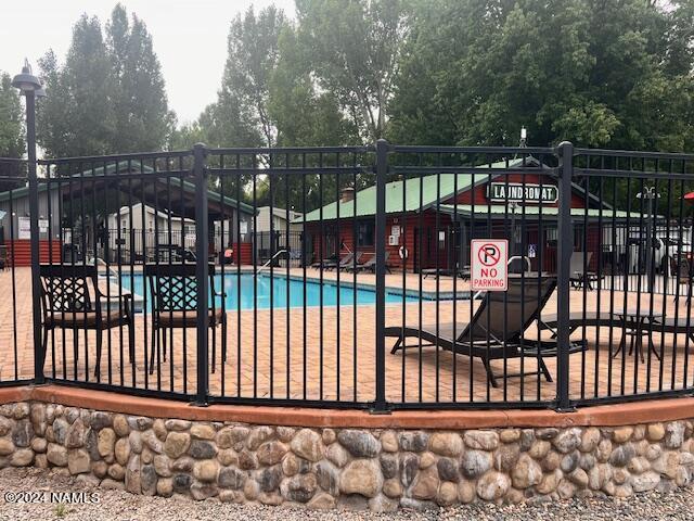 17550 South Munds Ranch Road, Unit 234 Munds Park, AZ 86017 - Photo 18 of 33 fenced in community pool