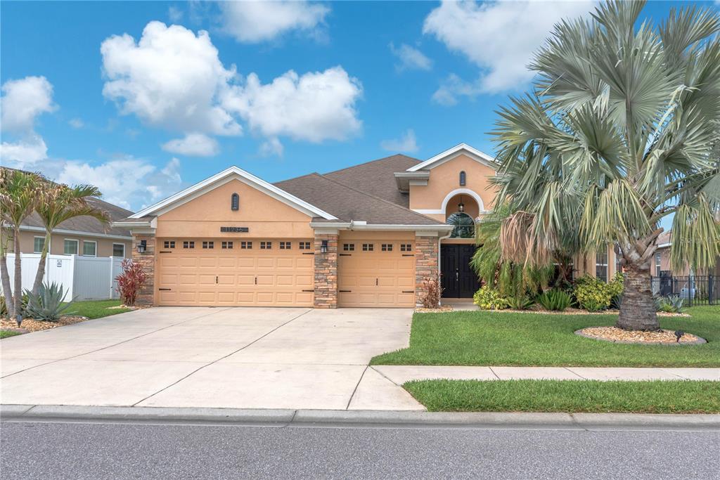 11236 77th Street East Parrish, FL 34219 - Photo 1 of 53 a view of a house with a yard
