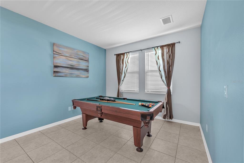 11236 77th Street East Parrish, FL 34219 - Photo 11 of 53 a room with pool table and windows