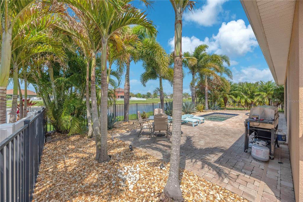 11236 77th Street East Parrish, FL 34219 - Photo 33 of 53 a view of a backyard patio and swimming pool