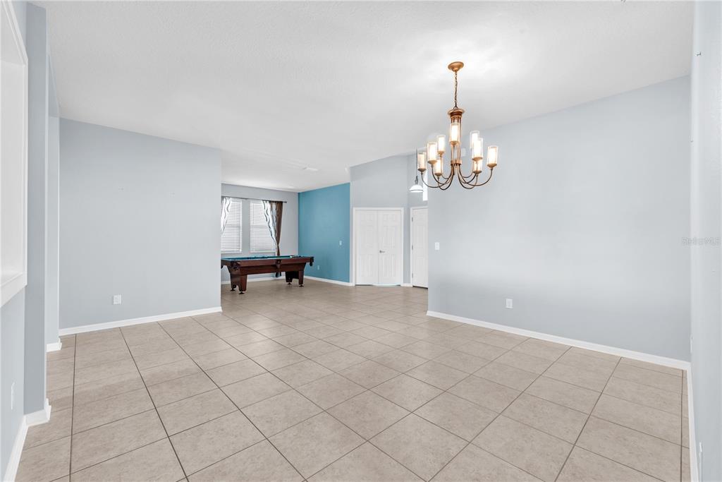11236 77th Street East Parrish, FL 34219 - Photo 10 of 53 a view of a chandelier in big room and chandelier
