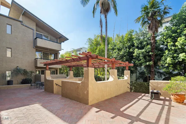 a outdoor space with lots of potted plants