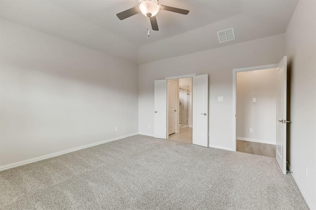 1405 Winters Way McKinney, TX 75071 - Photo 16 of 32 Unfurnished bedroom with light carpet and ceiling fan