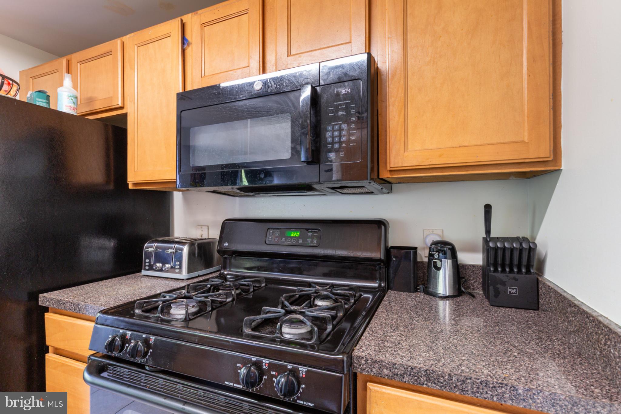 350 G Street Southwest, Unit N423 Washington, DC 20024 - Photo 21 of 43 Modern kitchen with sleek appliances.