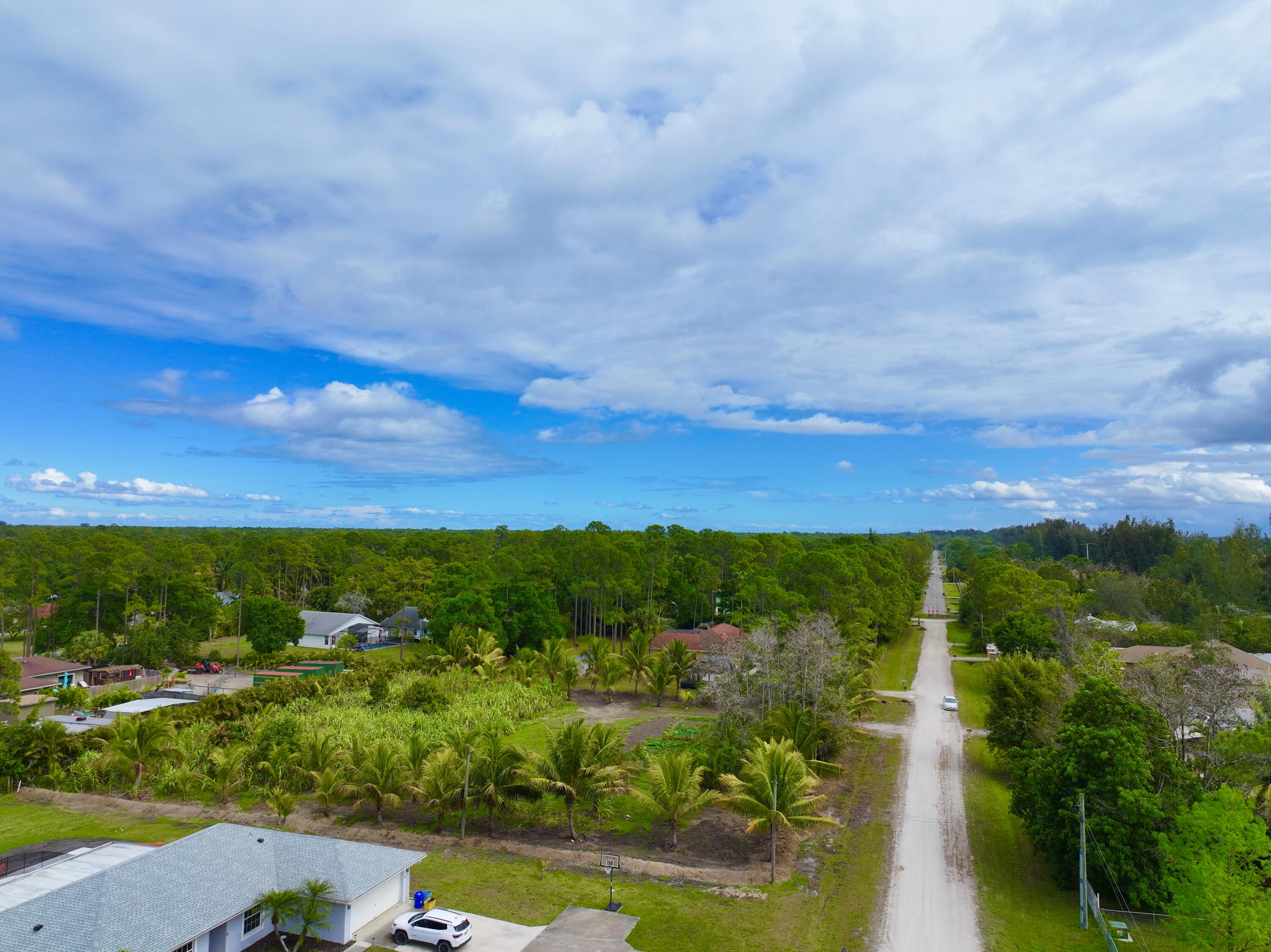 17853 60th Loxahatchee, FL 33470 - Photo 24 of 37 a view of a garden with houses