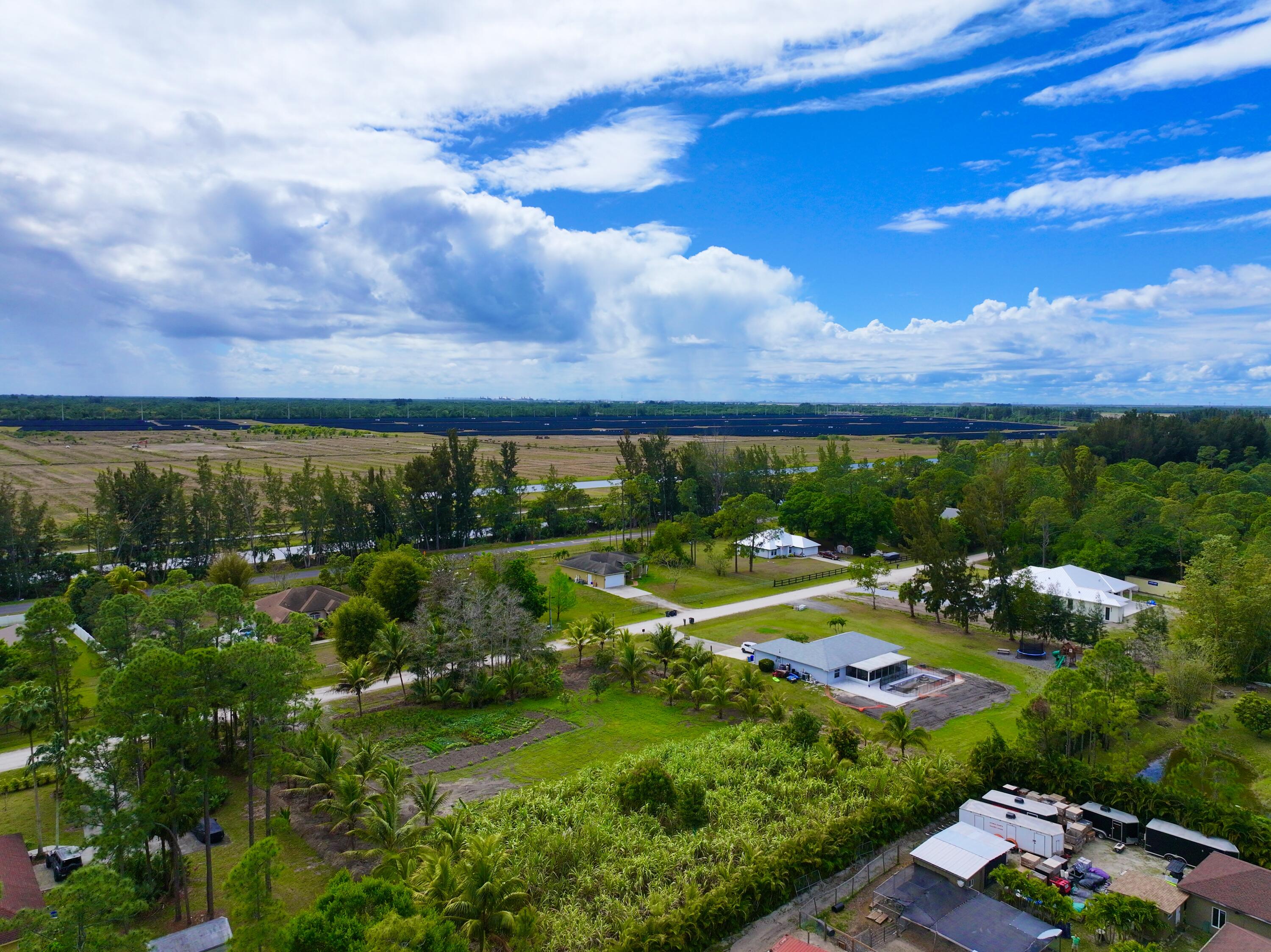 17853 60th Loxahatchee, FL 33470 - Photo 28 of 37 a view of a garden with houses