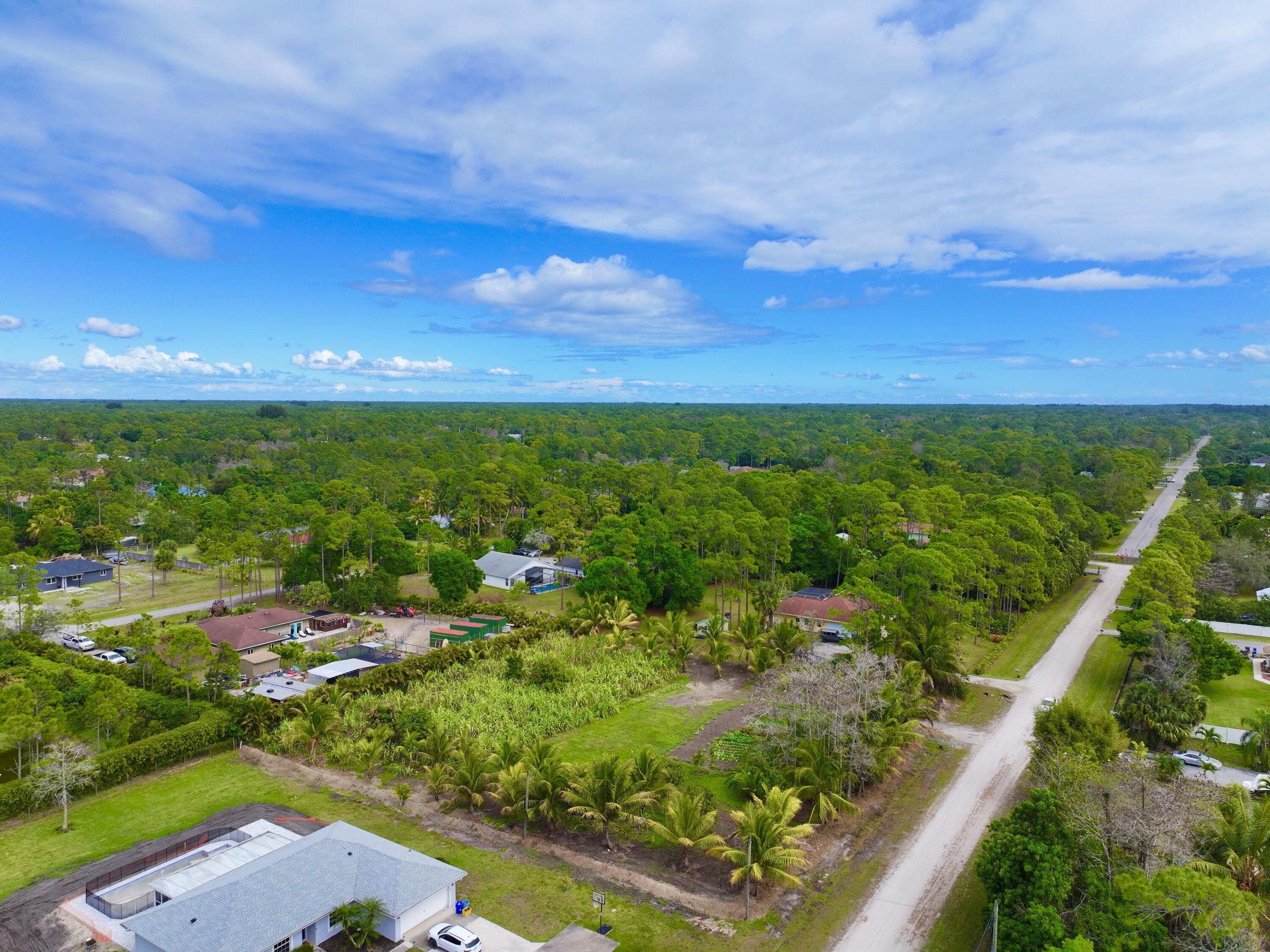 17853 60th Loxahatchee, FL 33470 - Photo 29 of 37 a view of a yard with an outdoor seating