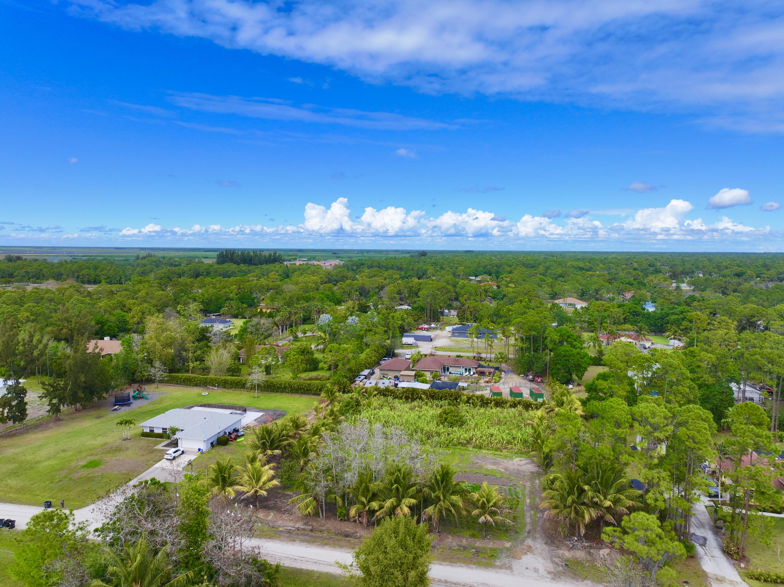 17853 60th Loxahatchee, FL 33470 - Photo 35 of 37 a view of a lake with a big yard