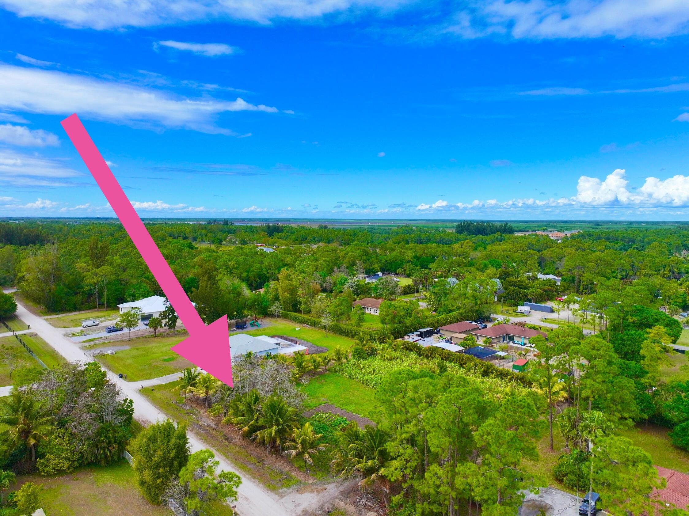 17853 60th Loxahatchee, FL 33470 - Photo 36 of 37 a view of a outdoor space with a swimming pool