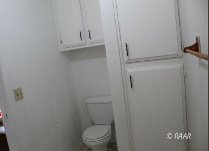 240 South Forest Knoll Street Ridgecrest, CA 93555 - Photo 16 of 23 a bathroom with a toilet and a shower