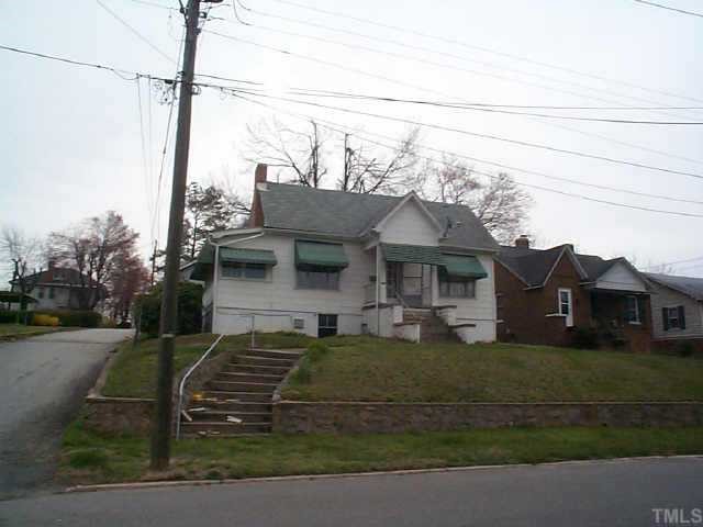 500 Lamar Street Roxboro, NC 27573 - Photo 1 of 1 a view of a house with a big yard plants and large tree