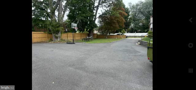 a view of a house with a street