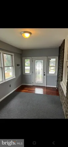 a view of empty room with front door