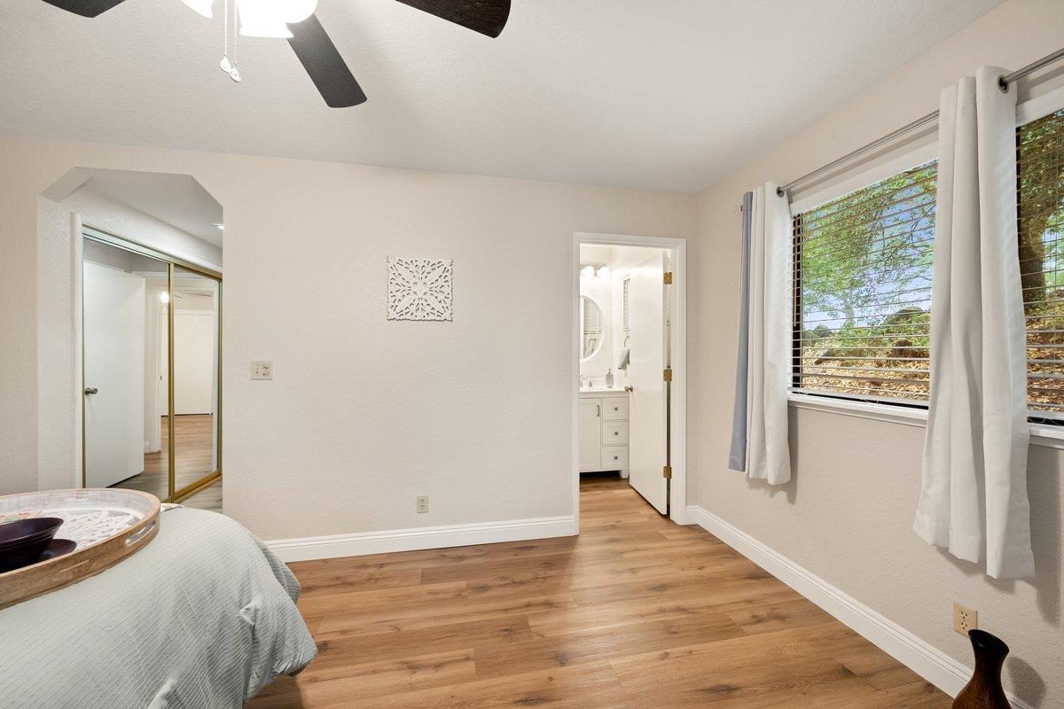 6561 Trinity Way Placerville, CA 95667 - Photo 17 of 58 a bedroom with a bed and a window