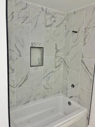 a bathroom with a bathtub