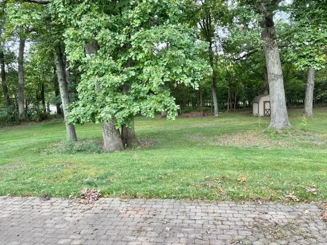 a fire hydrant in the middle of a field
