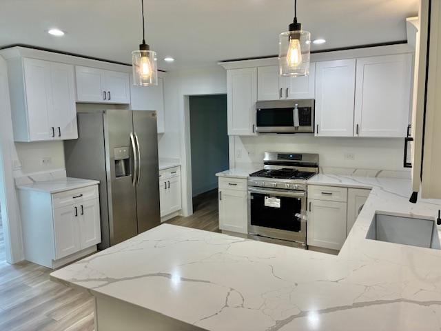24360 South Timberline Trail Crete, IL 60417 - Photo 4 of 25 a kitchen with stainless steel appliances a refrigerator stove and microwave