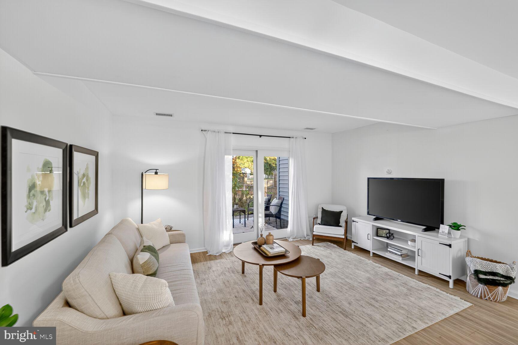 779 Match Point Drive Arnold, MD 21012 - Photo 3 of 28 a living room with furniture and a flat screen tv