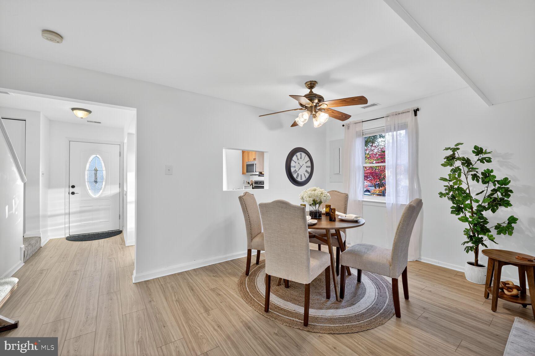 779 Match Point Drive Arnold, MD 21012 - Photo 10 of 28 a view of a dining room with furniture and wooden floor