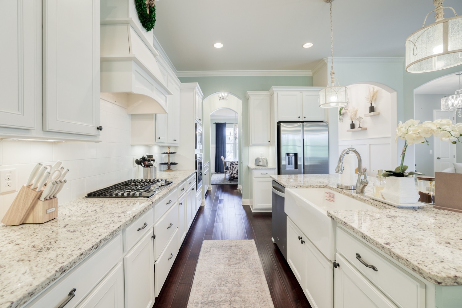 1146 Batbriar Road Murfreesboro, TN 37128 - Photo 20 of 56 a large kitchen with granite countertop a sink a stove refrigerator and cabinets