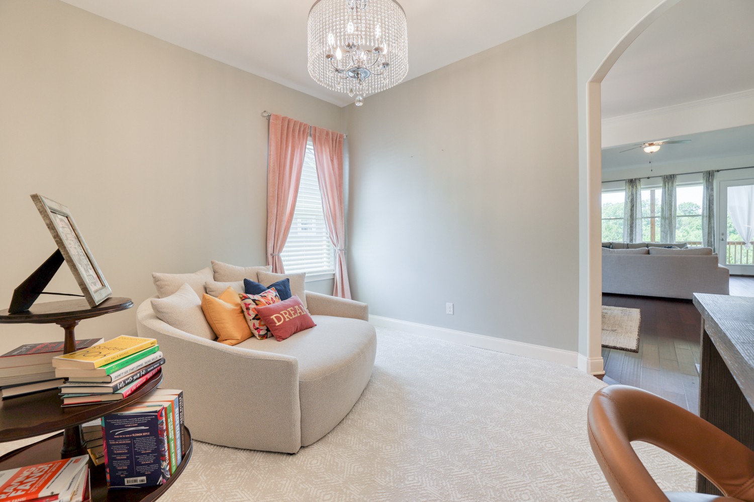 1146 Batbriar Road Murfreesboro, TN 37128 - Photo 25 of 56 a living room with furniture and a chandelier