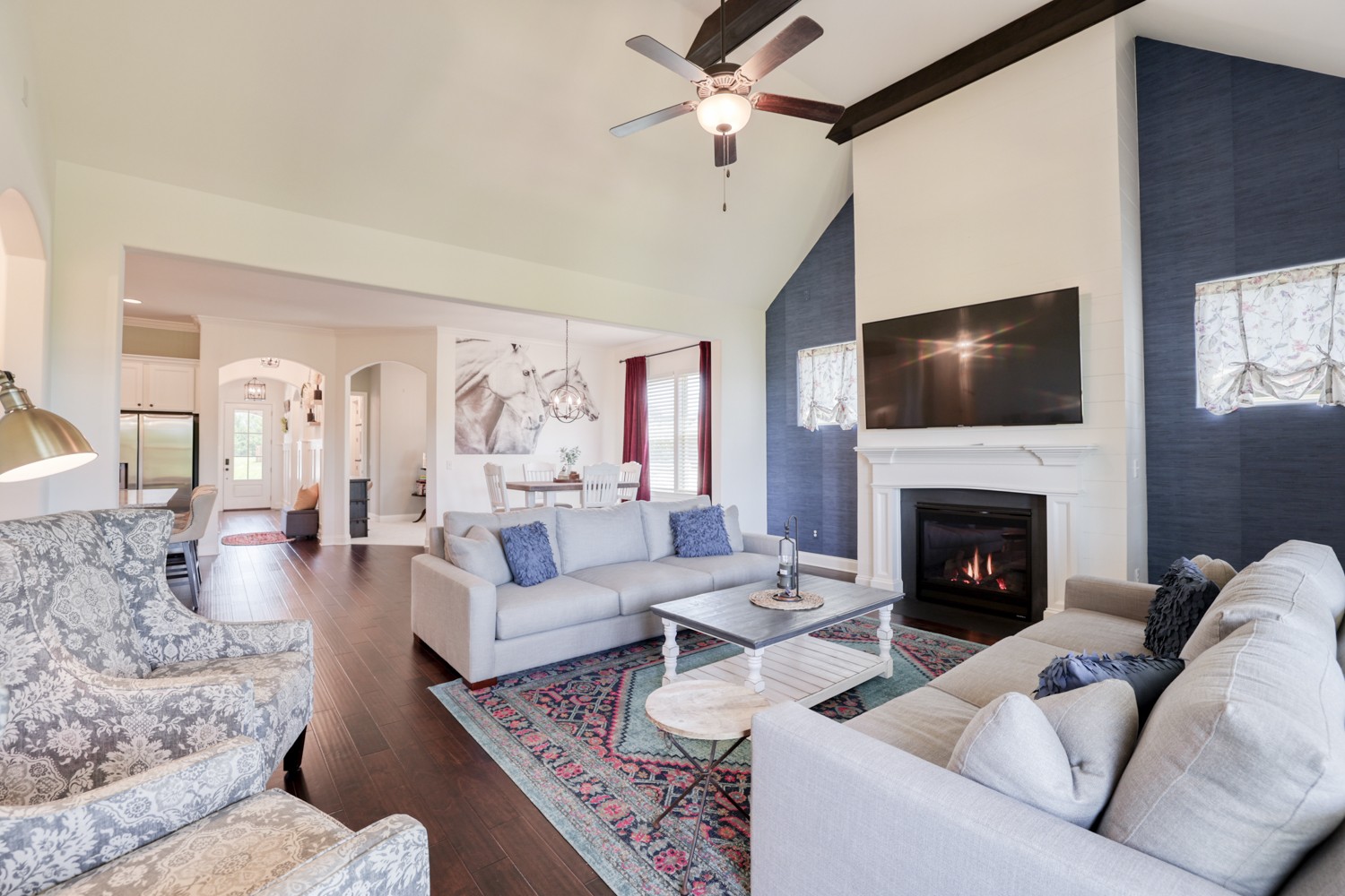 1146 Batbriar Road Murfreesboro, TN 37128 - Photo 28 of 56 a living room with furniture a fireplace and a flat screen tv
