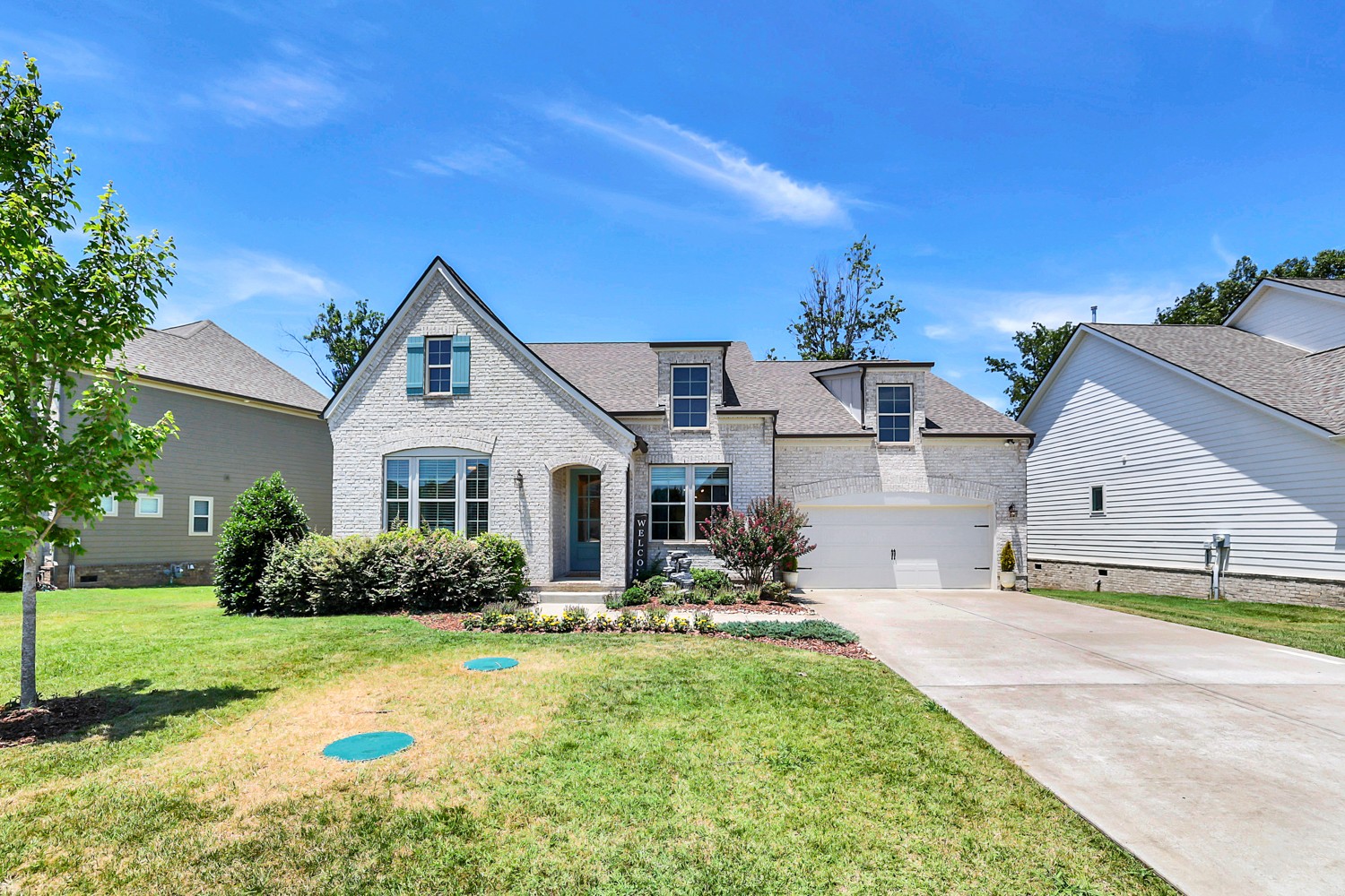 1146 Batbriar Road Murfreesboro, TN 37128 - Photo 3 of 56 a front view of a house with garden