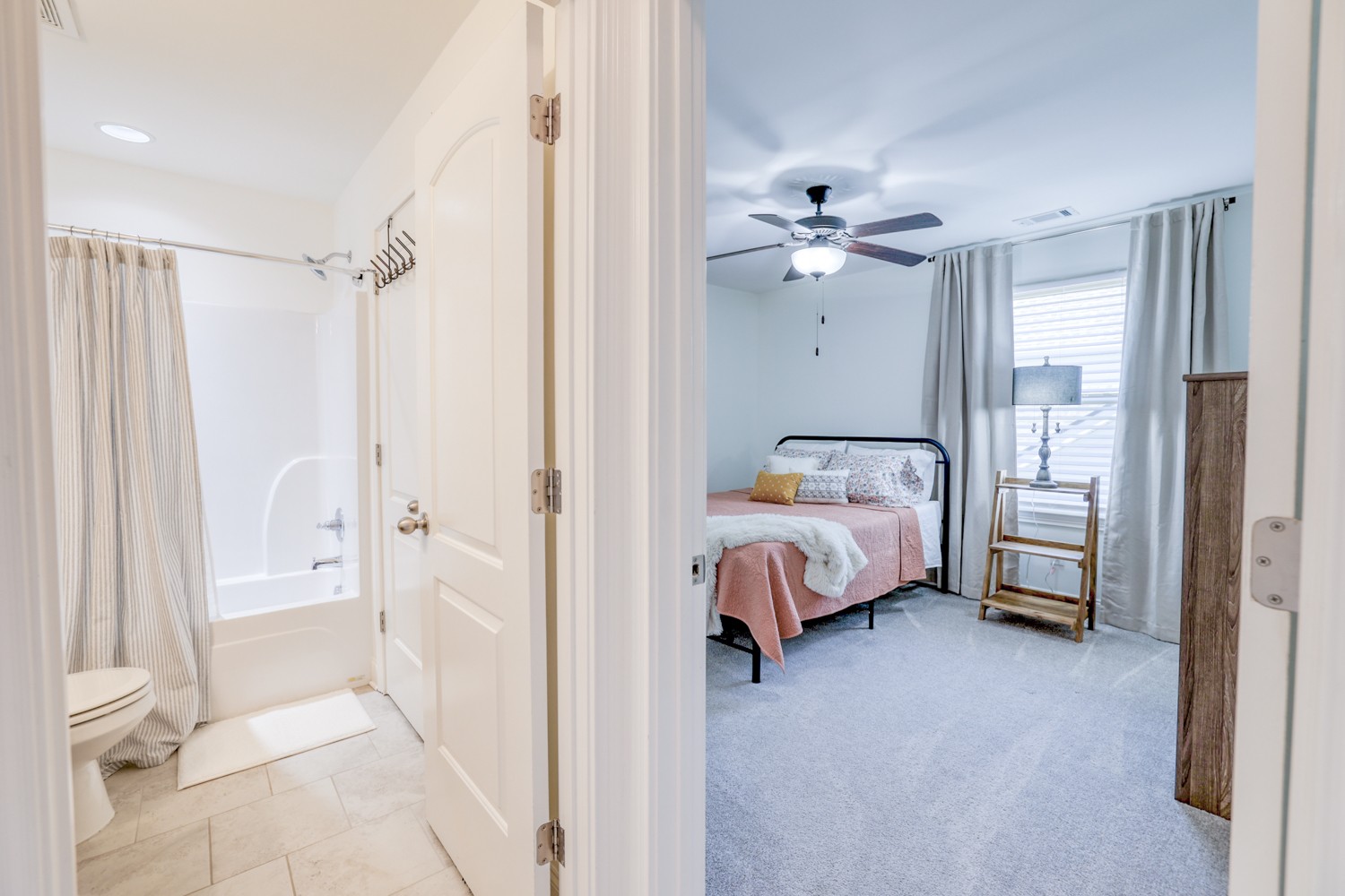 1146 Batbriar Road Murfreesboro, TN 37128 - Photo 44 of 56 a bedroom with a bed and a chandelier