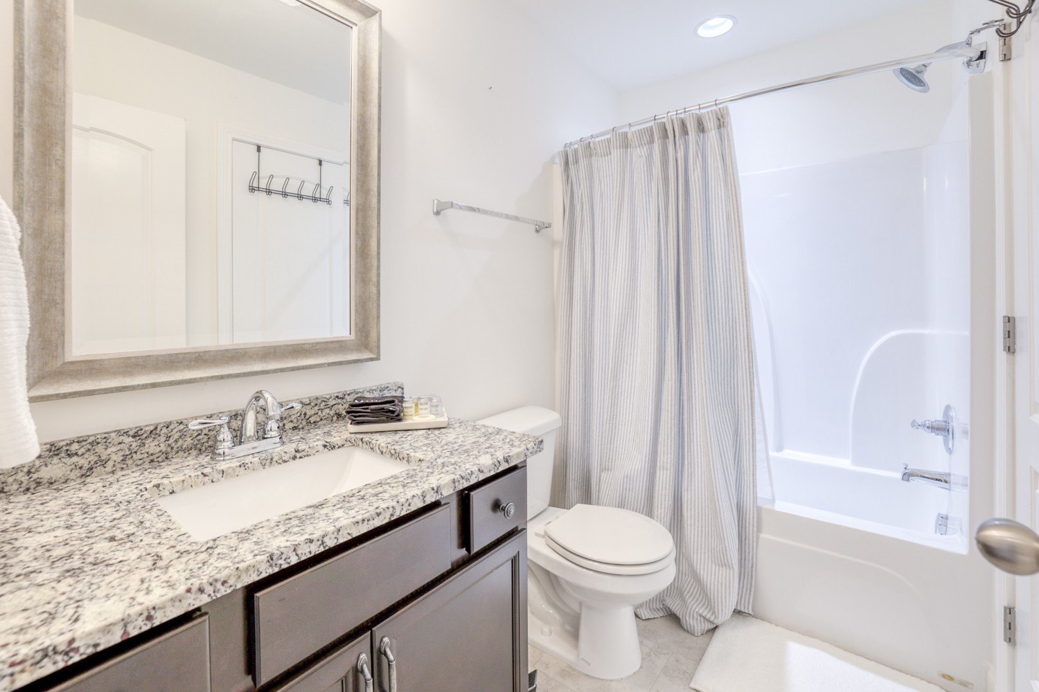 1146 Batbriar Road Murfreesboro, TN 37128 - Photo 46 of 56 a bathroom with a granite countertop sink toilet and shower