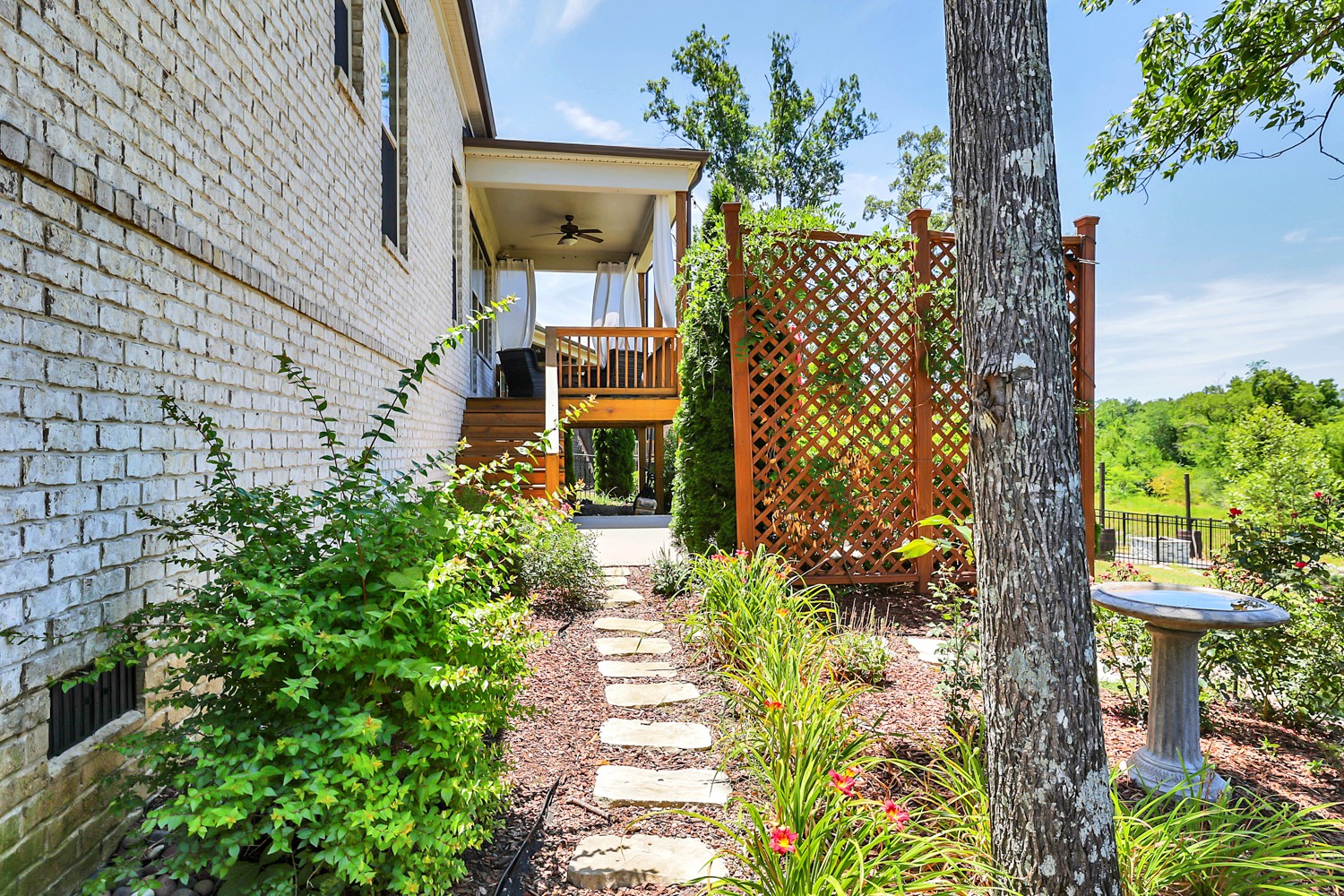 1146 Batbriar Road Murfreesboro, TN 37128 - Photo 54 of 56 a front view of a house with a yard