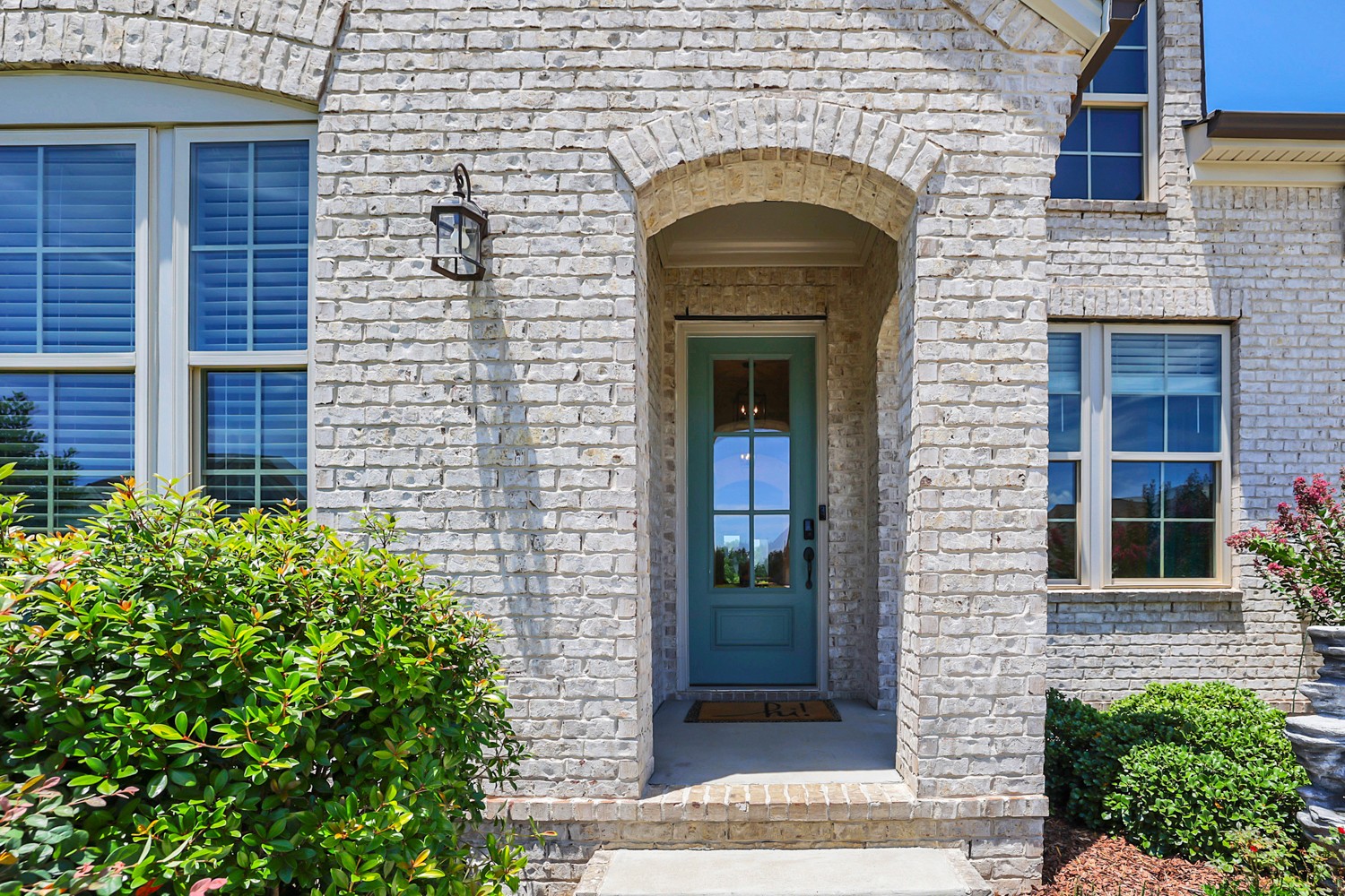 1146 Batbriar Road Murfreesboro, TN 37128 - Photo 6 of 56 a front view of a house with plants