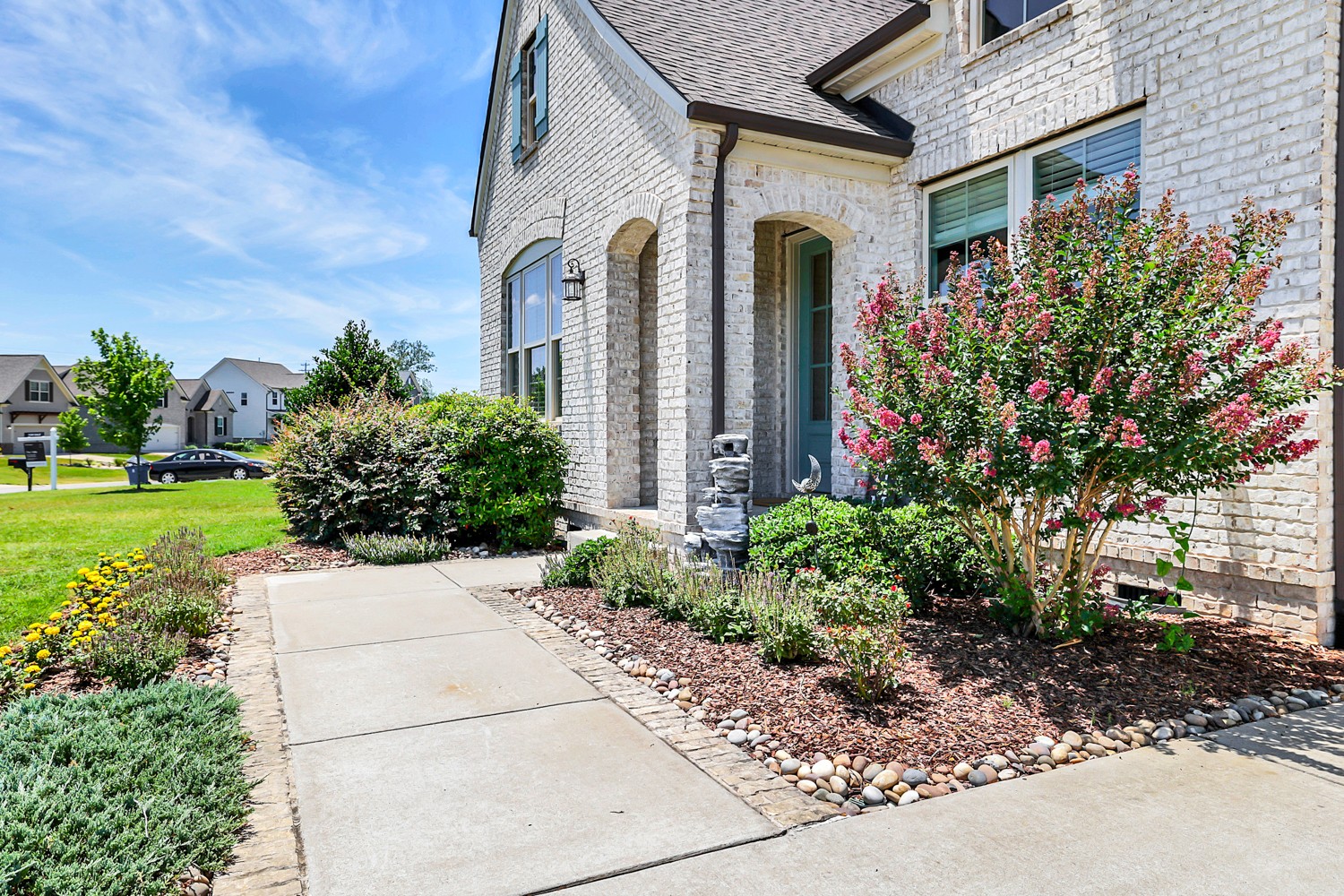 1146 Batbriar Road Murfreesboro, TN 37128 - Photo 7 of 56 a front view of a house with a yard