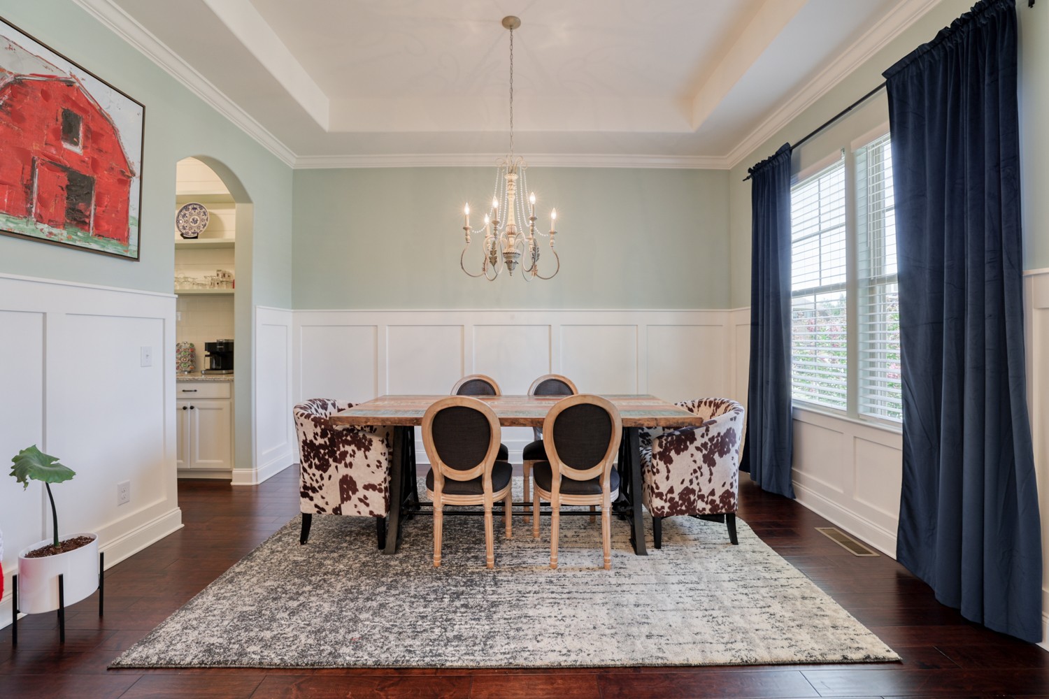1146 Batbriar Road Murfreesboro, TN 37128 - Photo 9 of 56 a view of a dining room with furniture a rug and wooden floor